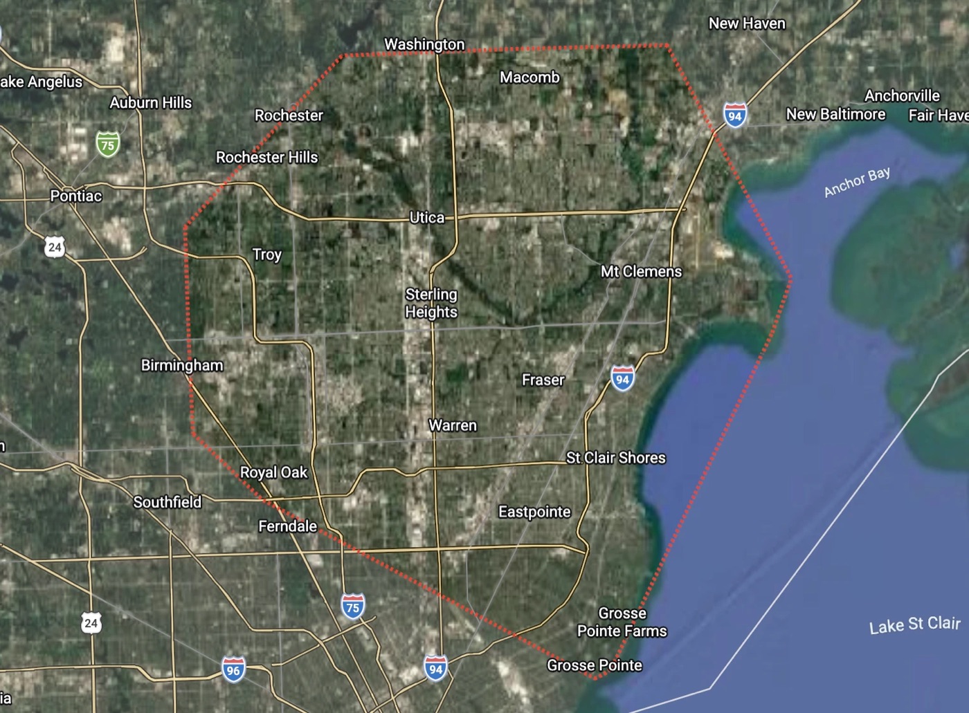 Map of Summit Snow and Lawn Services' coverage area across eastern Metro Detroit, outlined in red, spanning Rochester, Rochester Hills, Troy, Sterling Heights, Warren, Fraser, St. Clair Shores, Grosse Pointe, and New Baltimore